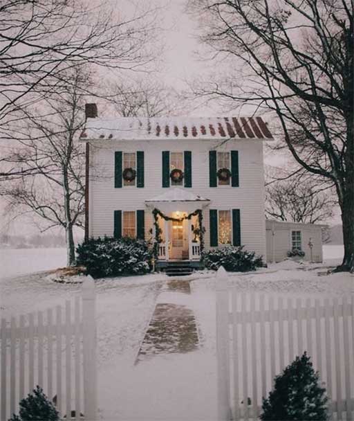 Picture of a snowy christmas house. Dr. Biesman, Nashville, TN