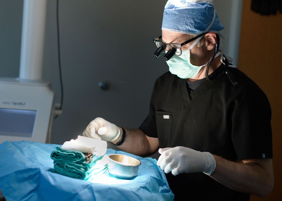 Dr. Biesman performing surgery